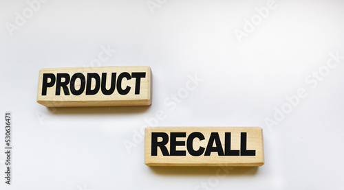 Wooden blocks with the words Product Recall. business concept