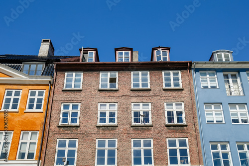 Copenhagen, Denmark - July 10, 2018: Buildings along the waterfront of Copenhagen
