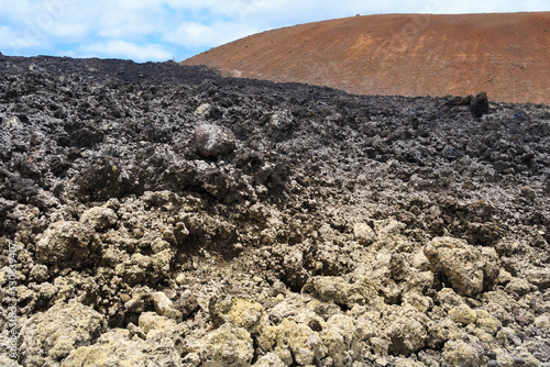 Quadro em tela Volcanoes, black lava and islets of Lanzarote seen from Caldera Blanca