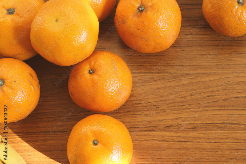 Tangerines on a wooden table. View from above. Tangerines on a wooden table. View from above.
