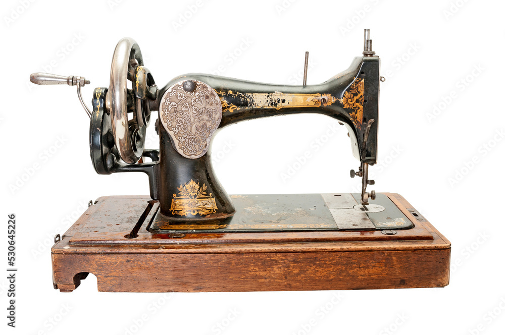 Vintage sewing machine on white background
