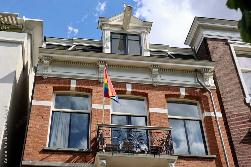 Rainbow flag of the LGBT community on the building, Amsterdam, The Netherlands