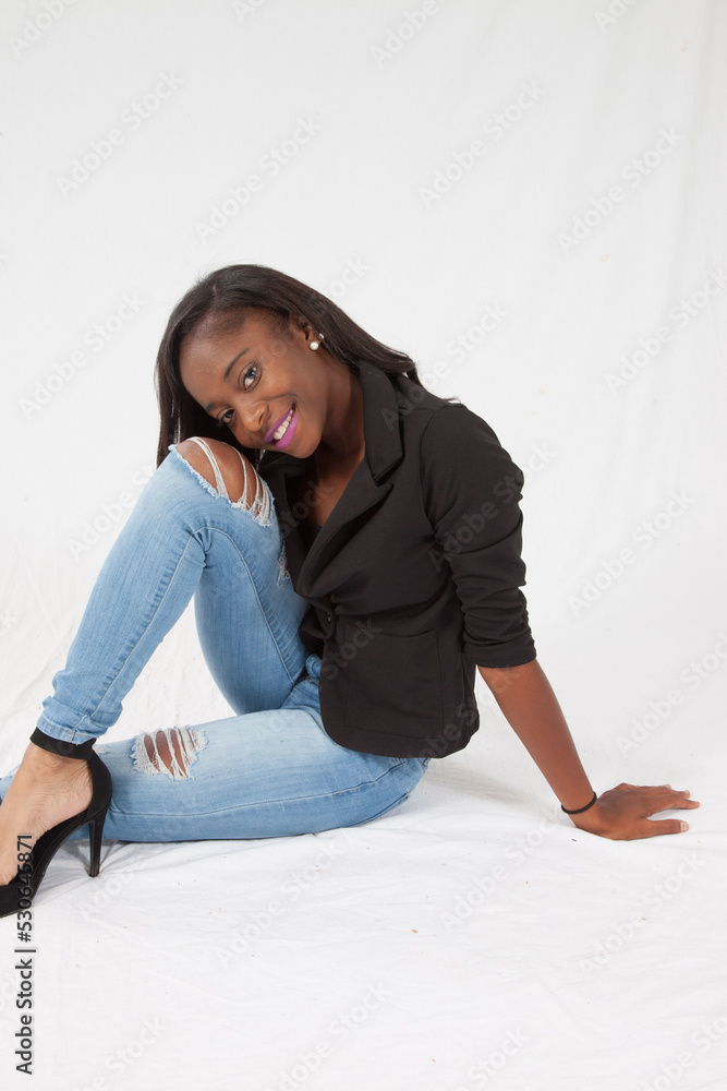 Pretty woman sitting with a smile Pretty woman sitting with a smile