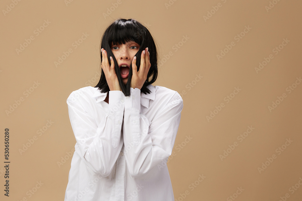 Happy enjoyed cute stylish adorable brunet lady in white shirt flirting smiling posing isolated on pastel beige studio background. Copy space Banner Offer. Pulp Fiction concept. Fashion Cinema Happy enjoyed cute stylish adorable brunet lady in white shirt flirting smiling posing isolated on pastel beige studio background. Copy space Banner Offer. Pulp Fiction concept. Fashion Cinema