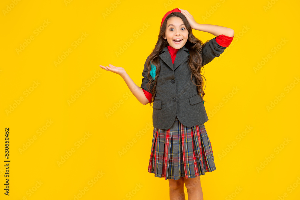 happy childhood. child presenting product, copy space. amazed teen girl carry backpack. happy childhood. child presenting product, copy space. amazed teen girl carry backpack.