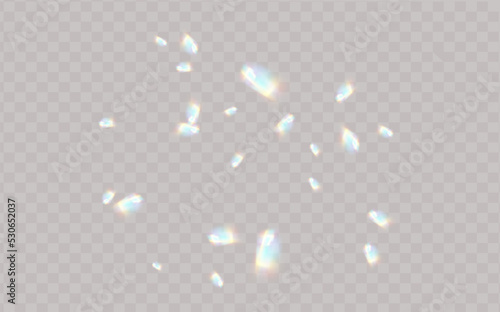 Rainbow highlights on a black background.Glare or reflection from water and glass.Glittering particles for social media backgrounds, product presentations, photo shots.