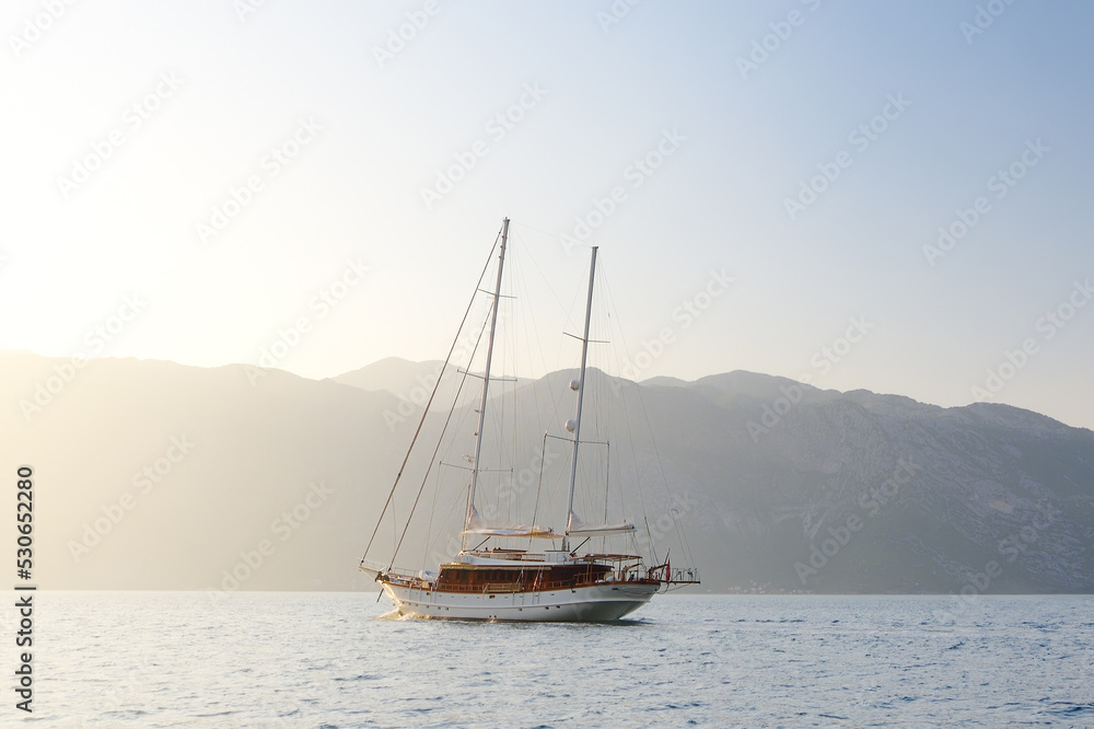 Stunning view of amazing bay with sailing boats on Boka Kotor bay (Boka Kotorska) of Adriatic Sea in Balkan, Montenegro, Europe.