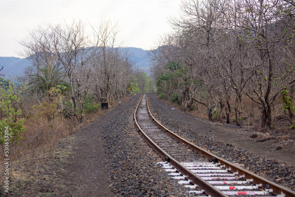 A scenic view of hill station and railway track at mountain village Kalakund near Mhow, Indore, Madhya Pradesh on a sunny summer day. Indian village.