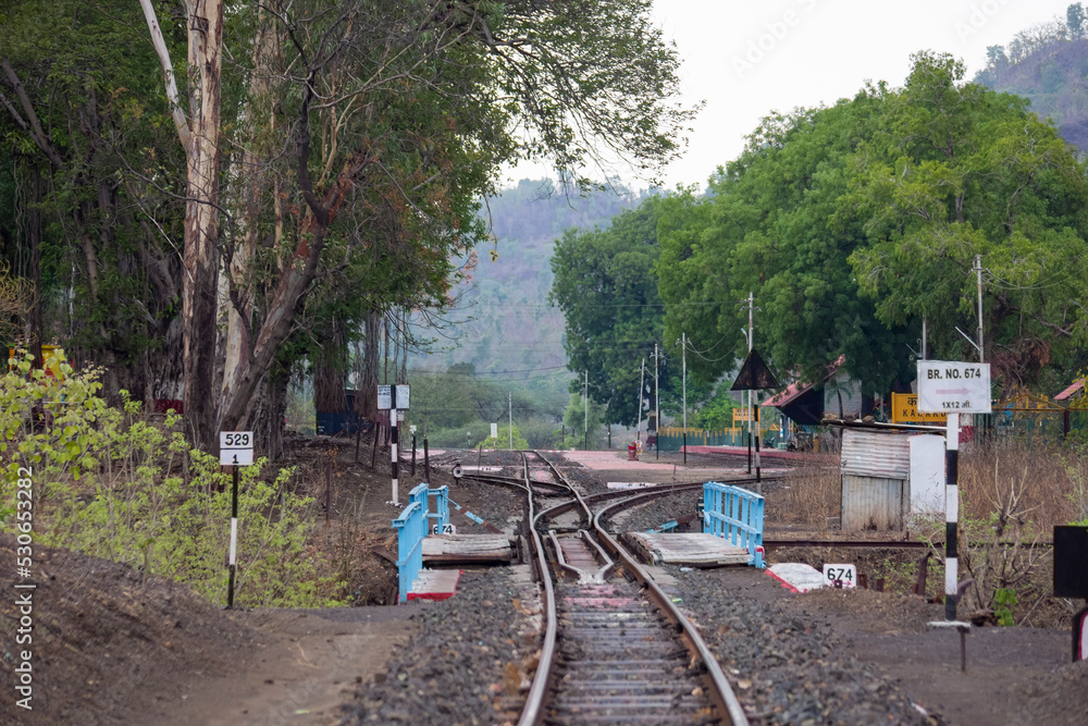A scenic view of railway station at hill station platform of mountain village Kalakund near Mhow, Indore, Madhya Pradesh on a sunny summer day. Indian village. A scenic view of railway station at hill station platform of mountain village Kalakund near Mhow, Indore, Madhya Pradesh on a sunny summer day. Indian village.