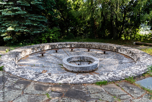 Old fountain without water in the park of Shipka monastery. Bulgaria.