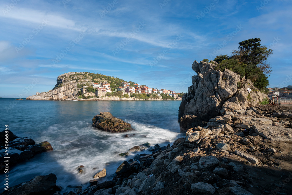 Amasra seascape, rock formations and cityscape of amasra city with blue sky and sea