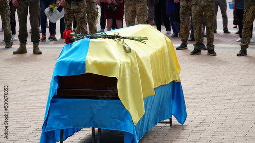 Ukraine. War. The funeral of Ukrainian soldiers who died during the Russian invasion of Ukraine. Coffin decorated with flowers. The funeral ceremony of a soldier. Funeral ceremony.