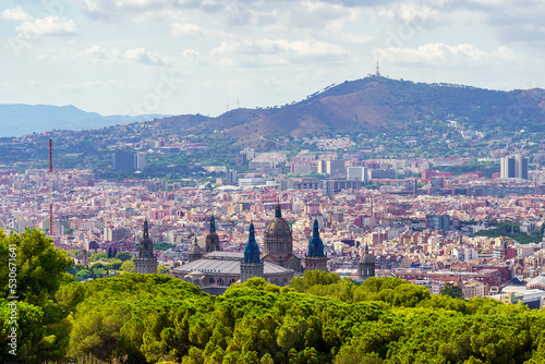 Panoramic view of the city of Barcelona with its buildings huddled next to the hills surrounding the city, Spain.