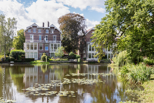 Expensive houses on the edge of the Vondelpark in the center of Amsterdam. photo