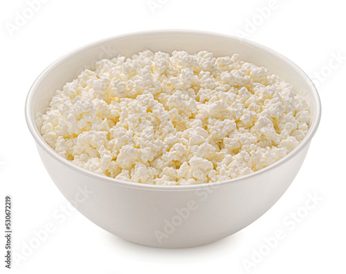 Bowl of cottage cheese isolated on white background