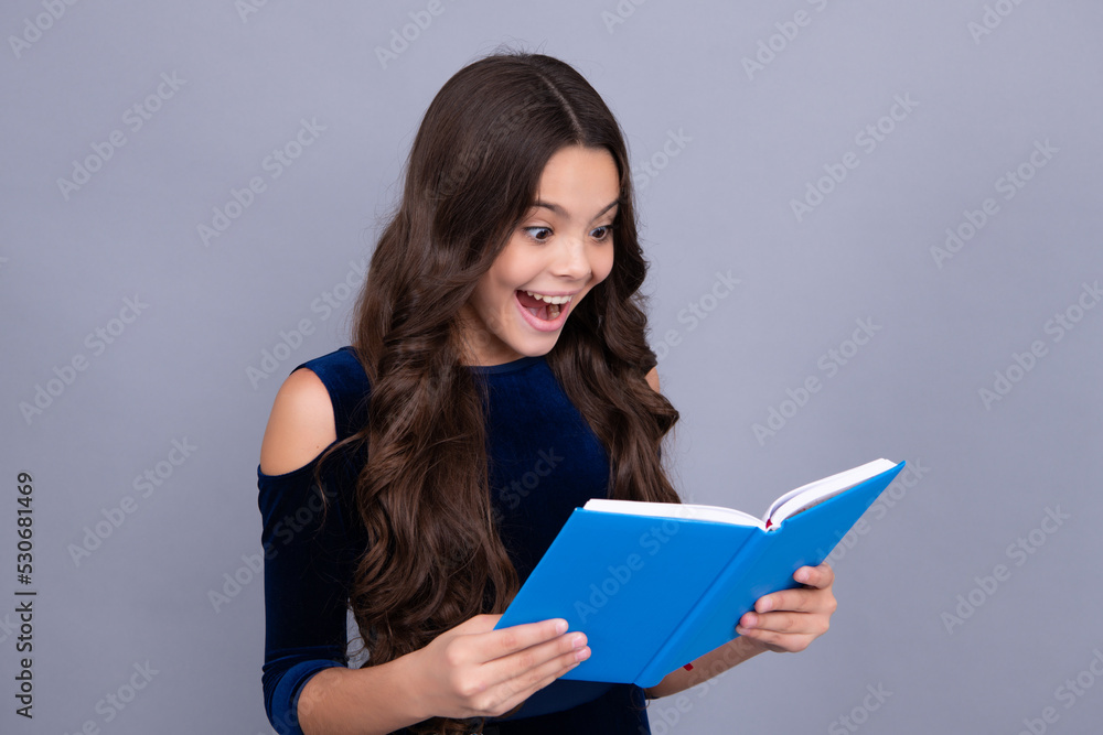 Back to school. Teenager schoolgirl hold book and copybook ready to learn. School children on isolated grey background. Excited teenager schoolgirl. Back to school. Teenager schoolgirl hold book and copybook ready to learn. School children on isolated grey background. Excited teenager schoolgirl.