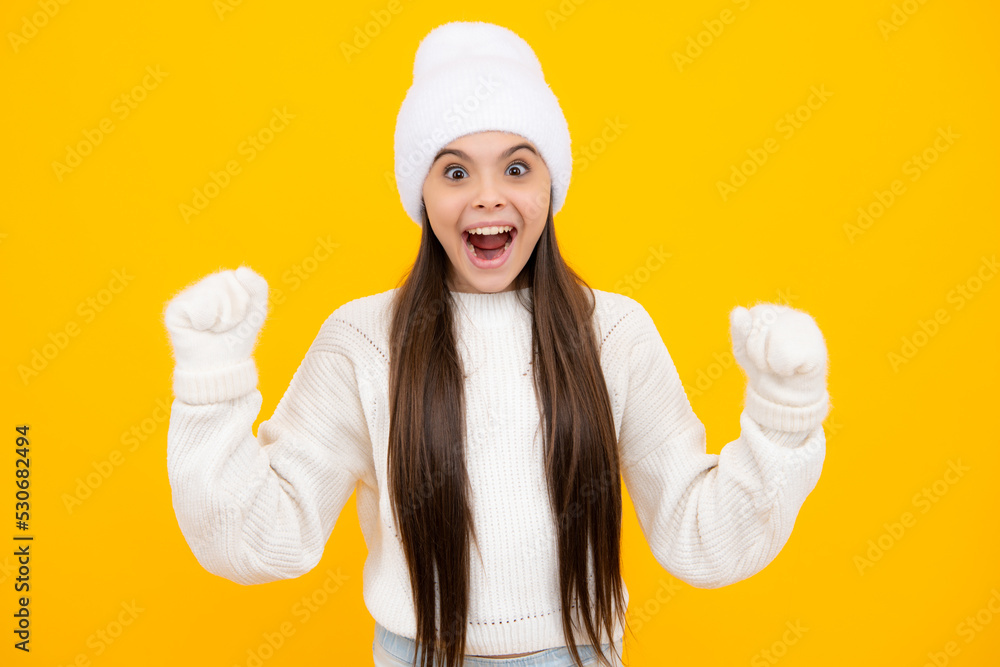Child girl rejoicing, say yes, looking happy and celebrating victory, champion gesture, fist pump, on yellow background. Child girl rejoicing, say yes, looking happy and celebrating victory, champion gesture, fist pump, on yellow background.