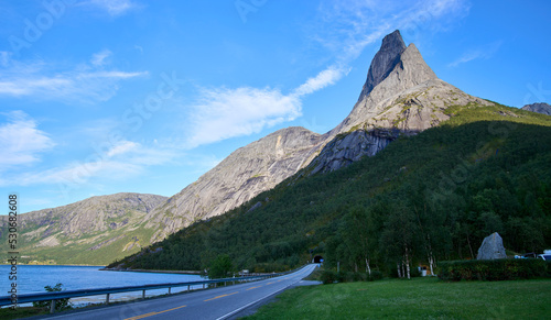 Stetind, mountain in Norway. A tall natural granite obelisk rising directly from a fjord. Stetind has an obelisk-shape which gives it very distinct look. Was chosen as the national mountain of Norway.