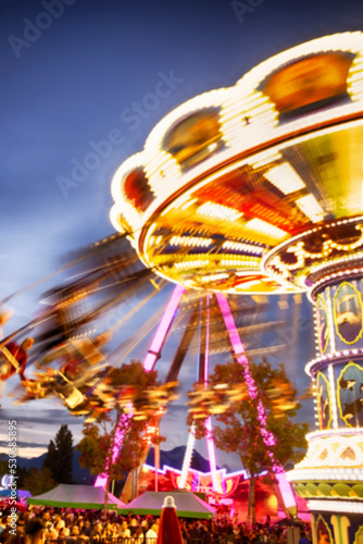 Blurred image of nostalgic amusement park ride