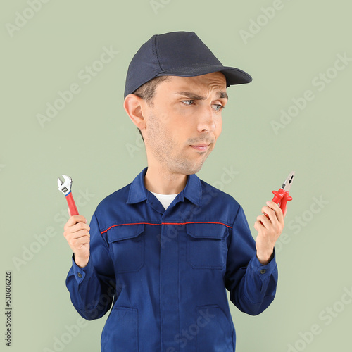 Funny car mechanic with big...