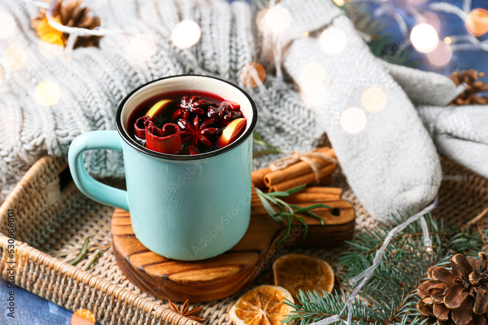 Mug of tasty mulled wine on table Mug of tasty mulled wine on table