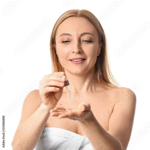 Mature woman with cosmetic ...