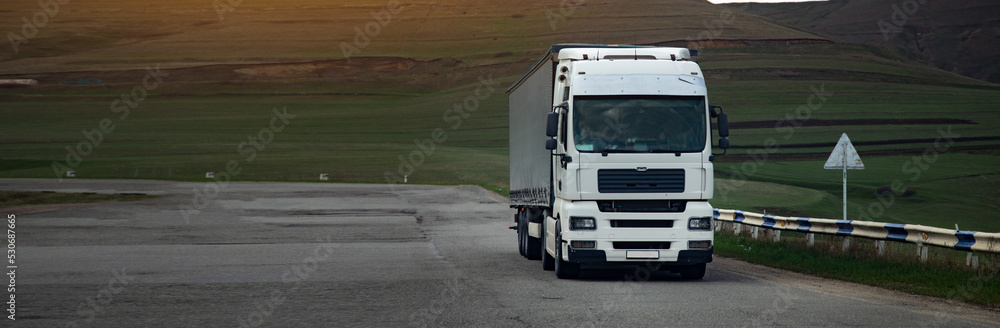 truck driving through the mountains