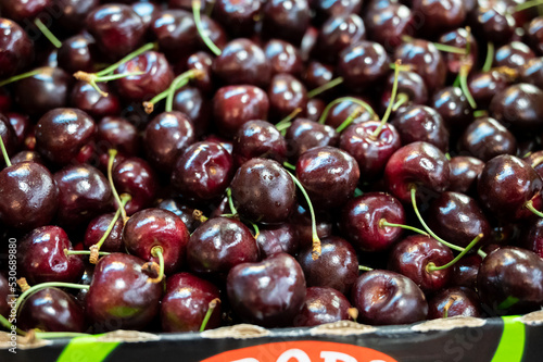 Fresh ripe sweet cherry berries on market © barmalini