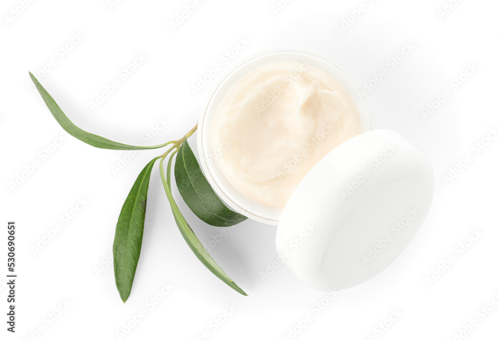 Jar of cream with olive branch on white background