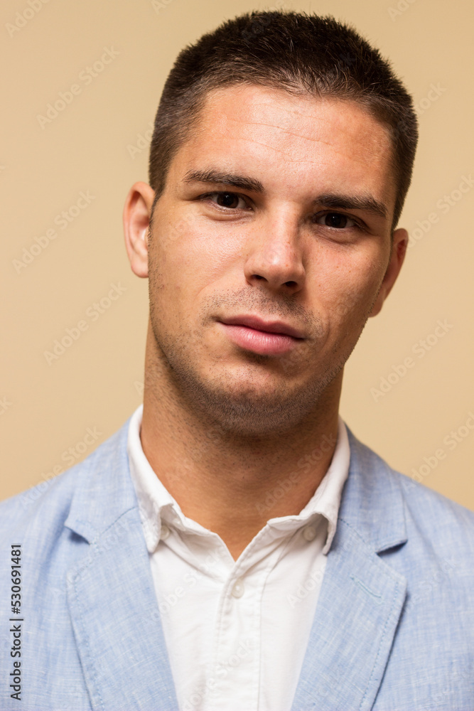Obraz premium Portrait of handsome young man in suit