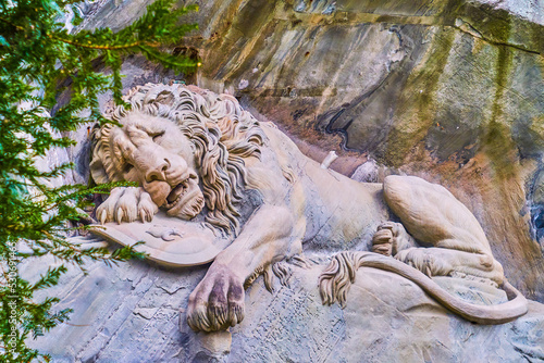 The dying lion (Lion Monument) is the most impressive monument, made in memory of fallen, Lucerne, Switzerland photo