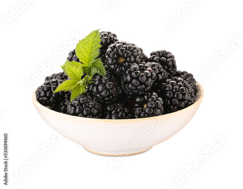Tasty ripe blackberries in bowl isolated on white