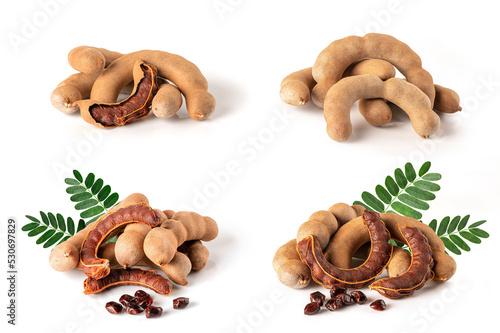 Set of Tamarind with green leaves isolated on white background.