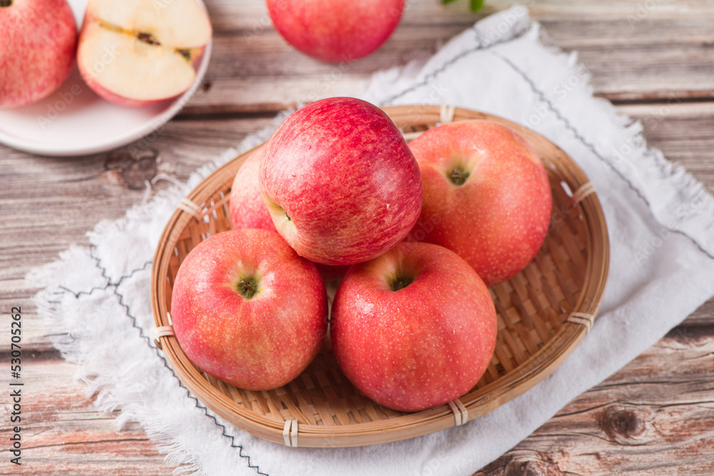 Red ripe apples on on wooden board background Red ripe apples on on wooden board background