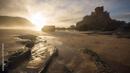 portugal Algarve sunset timelapse slider on the beach photo