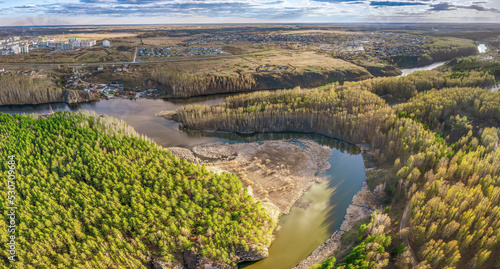 Confluence of the Iset and Kamenka rivers in the city Kamensk-Uralskiy. Iset and Kamenka rivers, Kamensk-Uralskiy, Sverdlovsk region, Ural mountains, Russia. Aerial view photo
