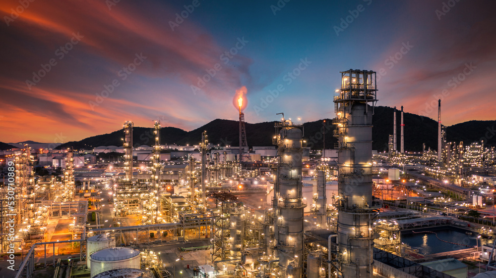 Oil and gas refinery plant form industry zone at night, Aerial view oil ...