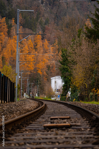 Beautiful railways in Interlaken city , resort town in oberland region , during autumn , winter cloudy day : Interlaken , Switzerland : December 3 , 2019
