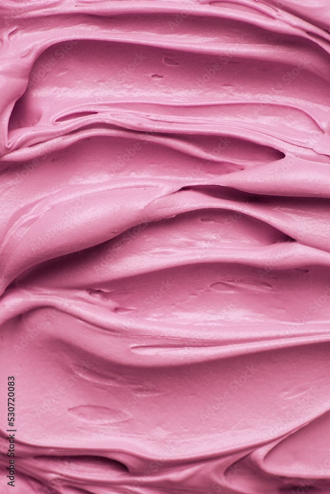 Bright pink icing frosting close up texture Bright pink icing frosting close up texture