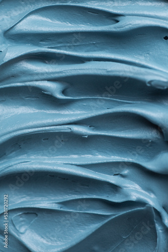 Light blue icing frosting close up texture