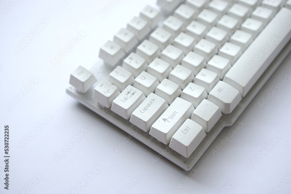 Used white computer keyboard that is not used until it gets dusty Used white computer keyboard that is not used until it gets dusty