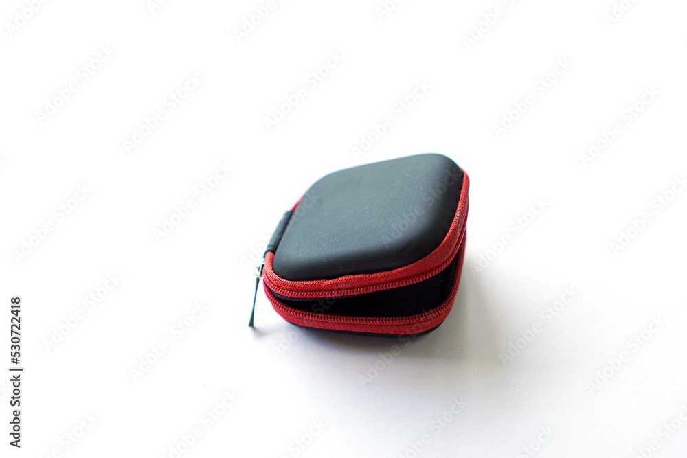 synthetic leather case for earphone storage on white background. synthetic leather case for earphone storage on white background.