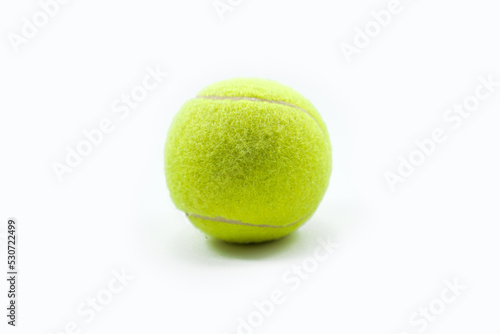 Yellow tennis ball made of felt and rubber © Bayu
