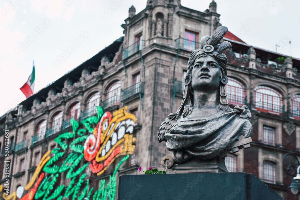 Cuauhtemoc statue in Zocalo in historic center of Mexico City, CDMX, Mexico. Cuauhtemoc is the last Aztec Emperor and ruler of Tenochtitlan from 1520 to 1521.