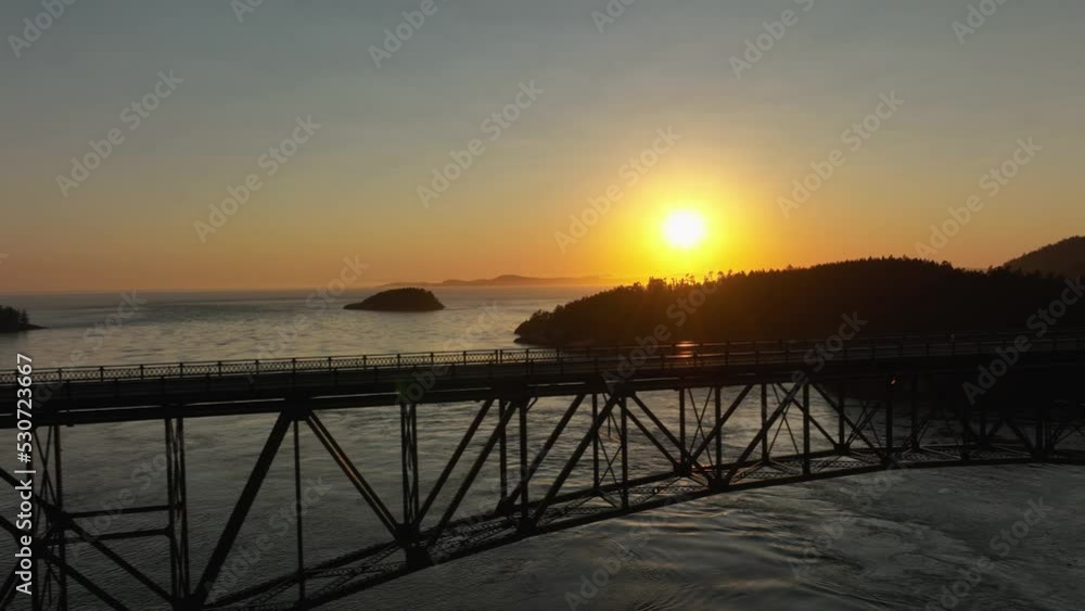 Empty Deception Pass Bridge during a beautiful summer sunset. Empty Deception Pass Bridge during a beautiful summer sunset.