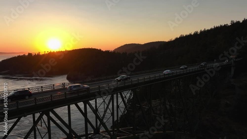 Wallpaper Mural Aerial shot of a busy Deception Pass Bridge at sunset. Torontodigital.ca