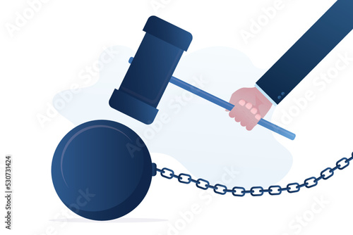 Businessman hand uses big hammer to break chain burden. Break free or breaking bad habits or routines for freedom, pay off debt, destroy shackle or fear burden, liberation.