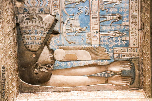 Egyptian goddess Nut swallowing the sun, repersenting sunset, Dendera, Egypt photo