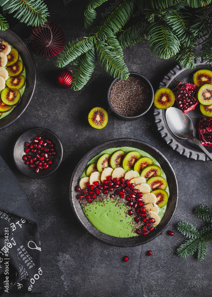 Green smoothie bowl with kiwi, banana and pomegranate. Green smoothie bowl with kiwi, banana and pomegranate.