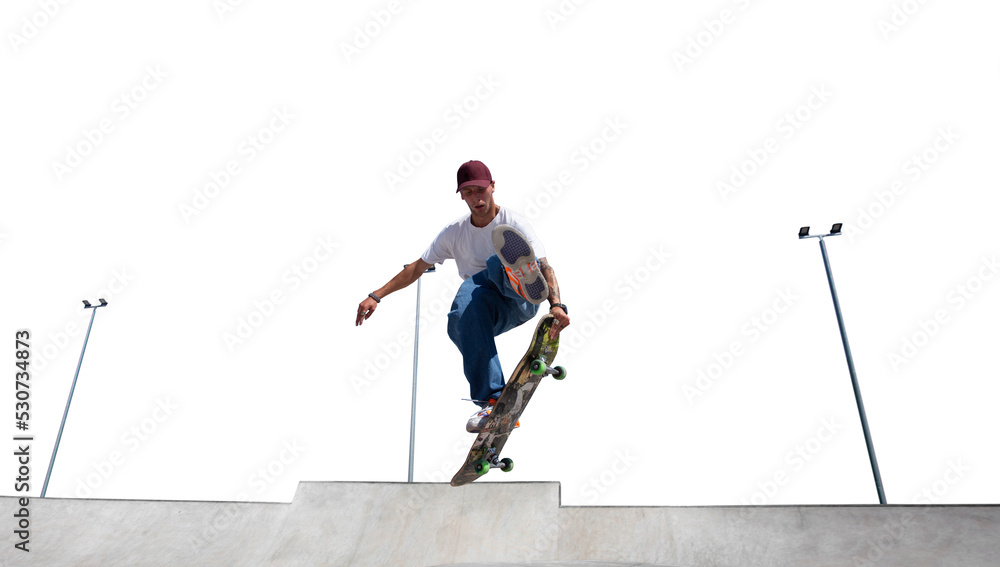 Naklejka premium Skateboarder doing a trick isolated on white background